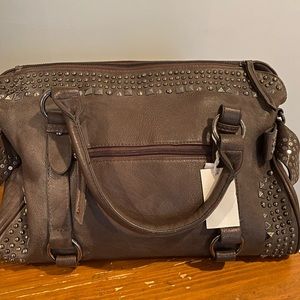 Studded brown leather bag